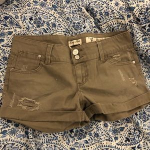 army green ripped shorts size 7